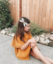 Load image into Gallery viewer, oversized schoolgirl bow cotton plaid red headband alligator clip holiday bow